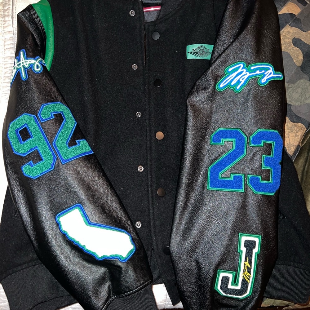 Nike air Jordan faux leather black jacket.